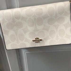 Coach Cream Clutch with Signature Pattern